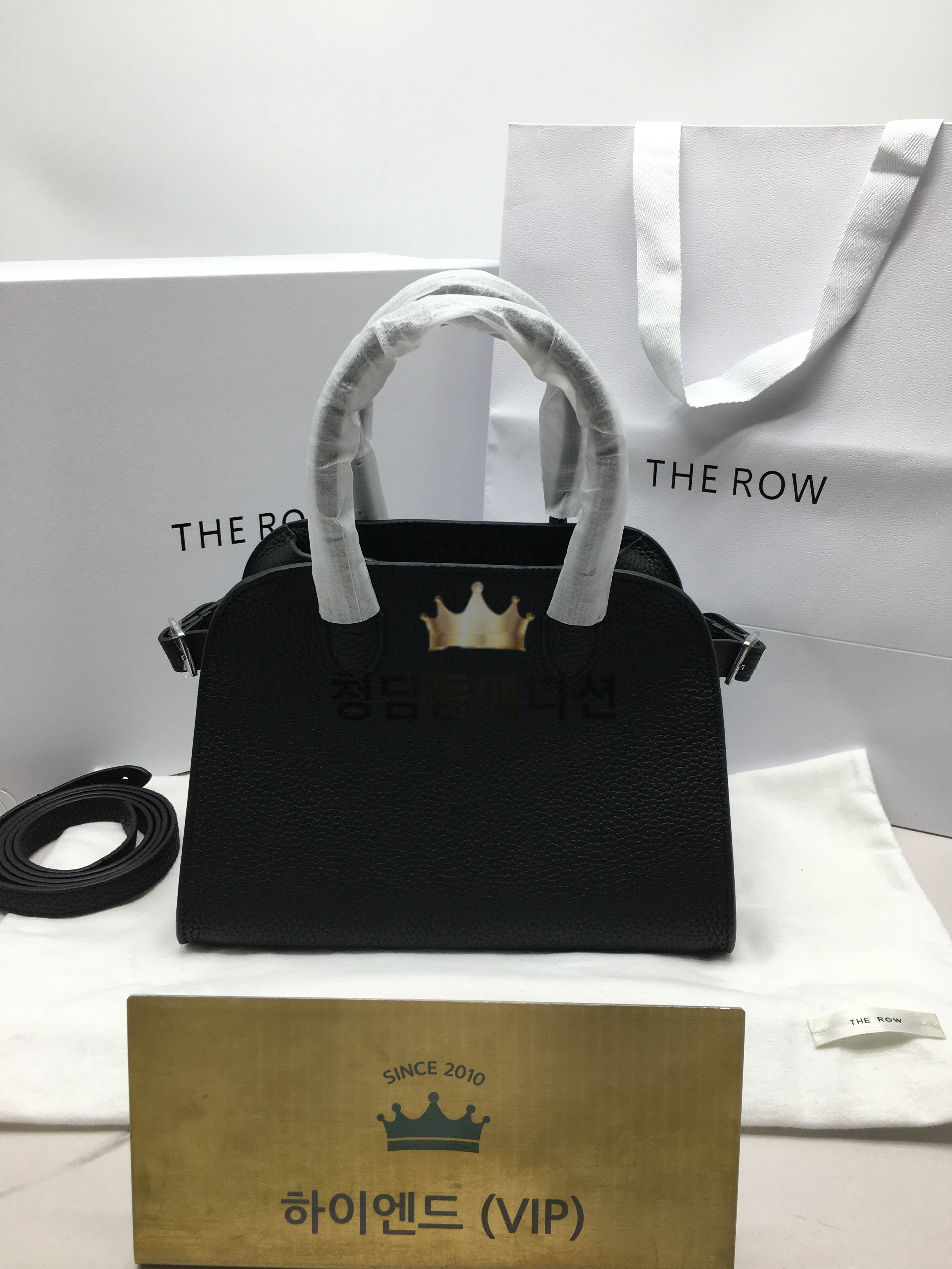 더 로우 N/S 마고 10 백 그레인 레더 실버